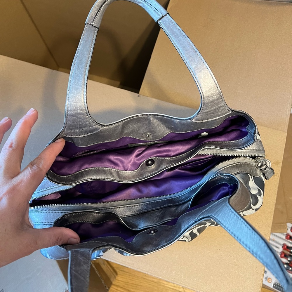 30. Nice tote 👜 it’s no in use anymore. Super cute for any event. You will love